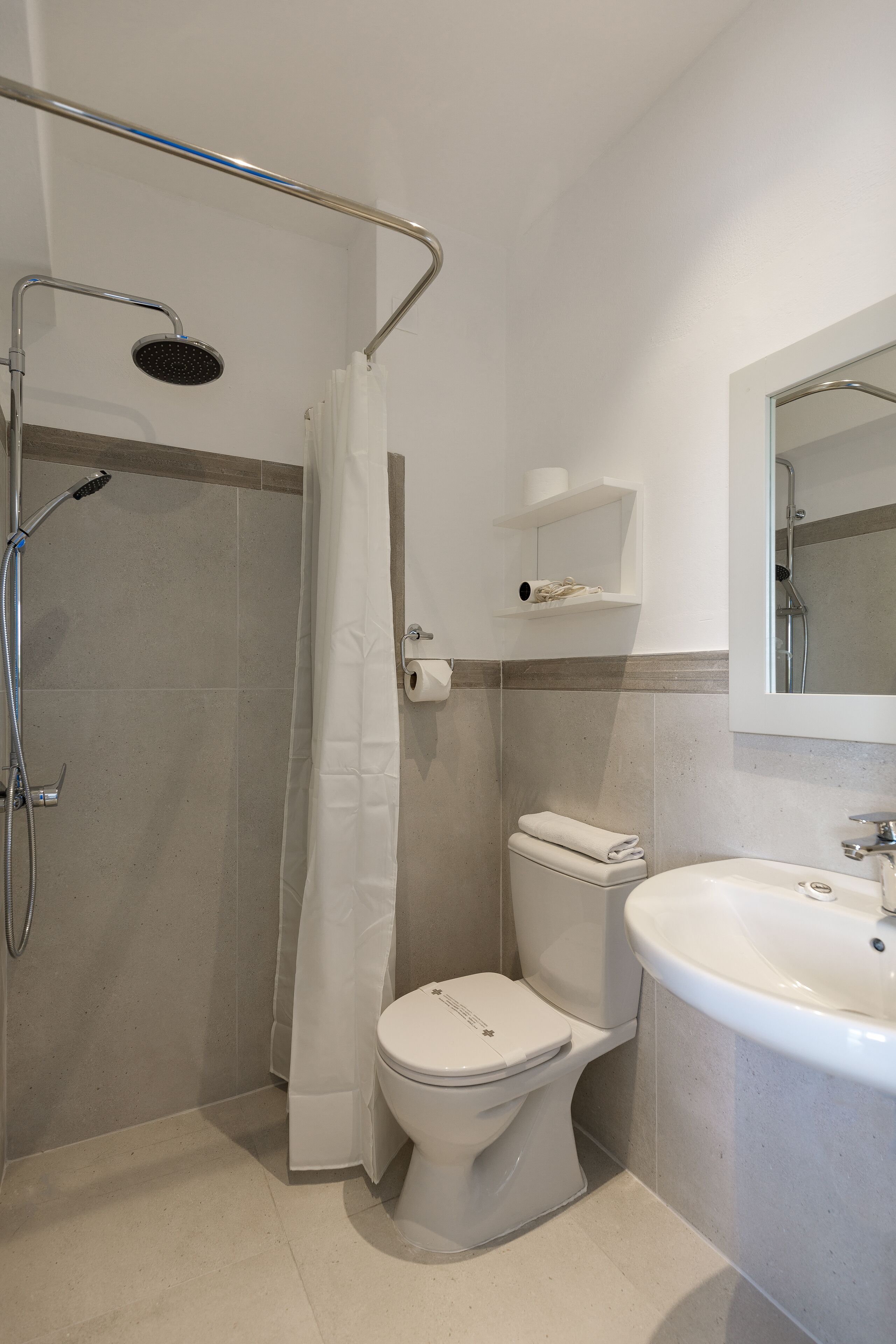 separate bathtub and shower, jetted bath, rainfall showerhead