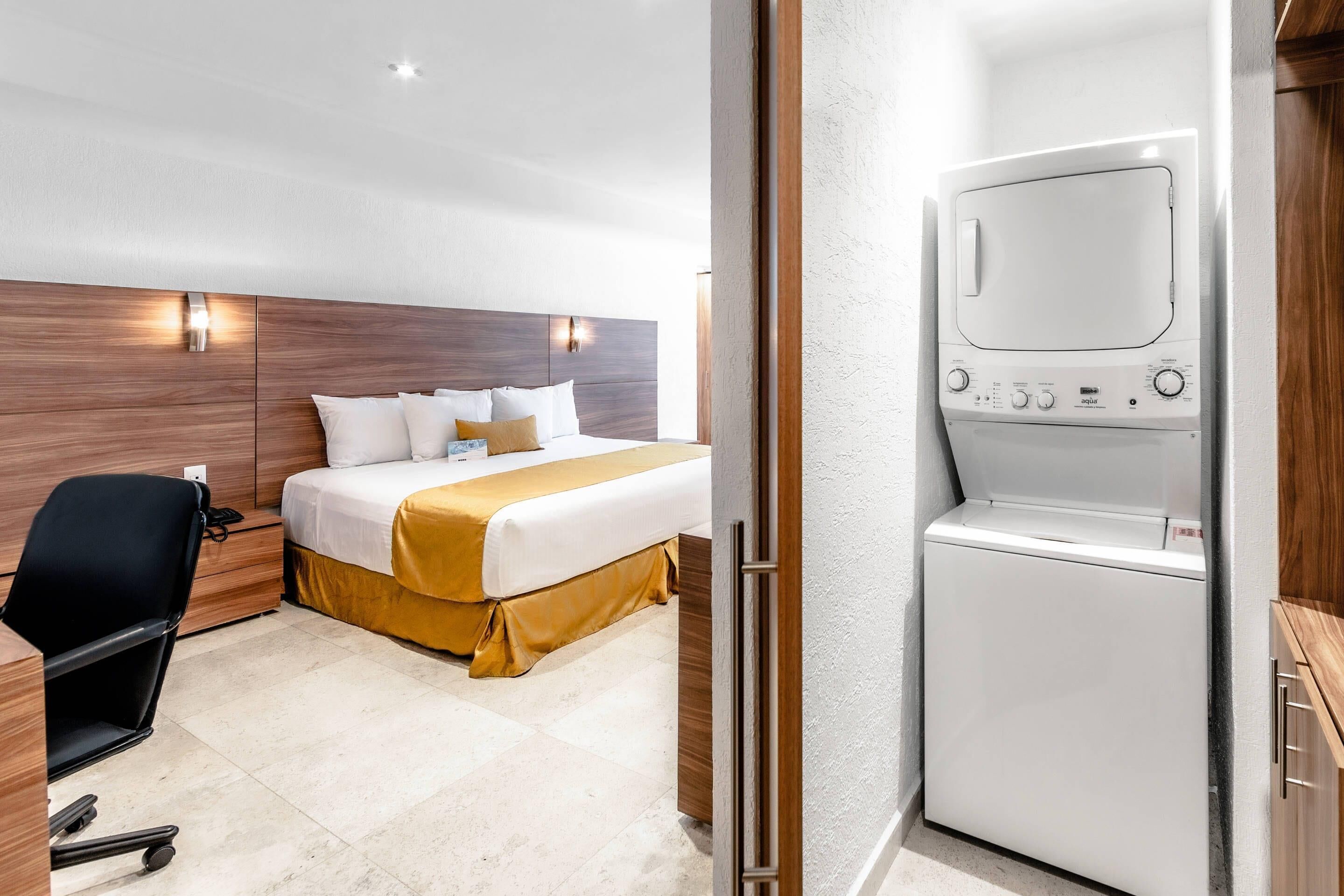 suite, 1 king bed, non smoking | 1 bedroom, down duvets, in-room safe, individually decorated