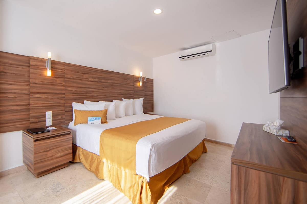 Suite, plusieurs lits | 1 chambre, couette en duvet d'oie, coffres-forts dans les chambres