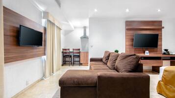 Suite, 1 King Bed, Non Smoking | Down comforters, in-room safe, individually decorated