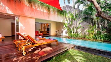 Outdoor pool, pool umbrellas, pool loungers