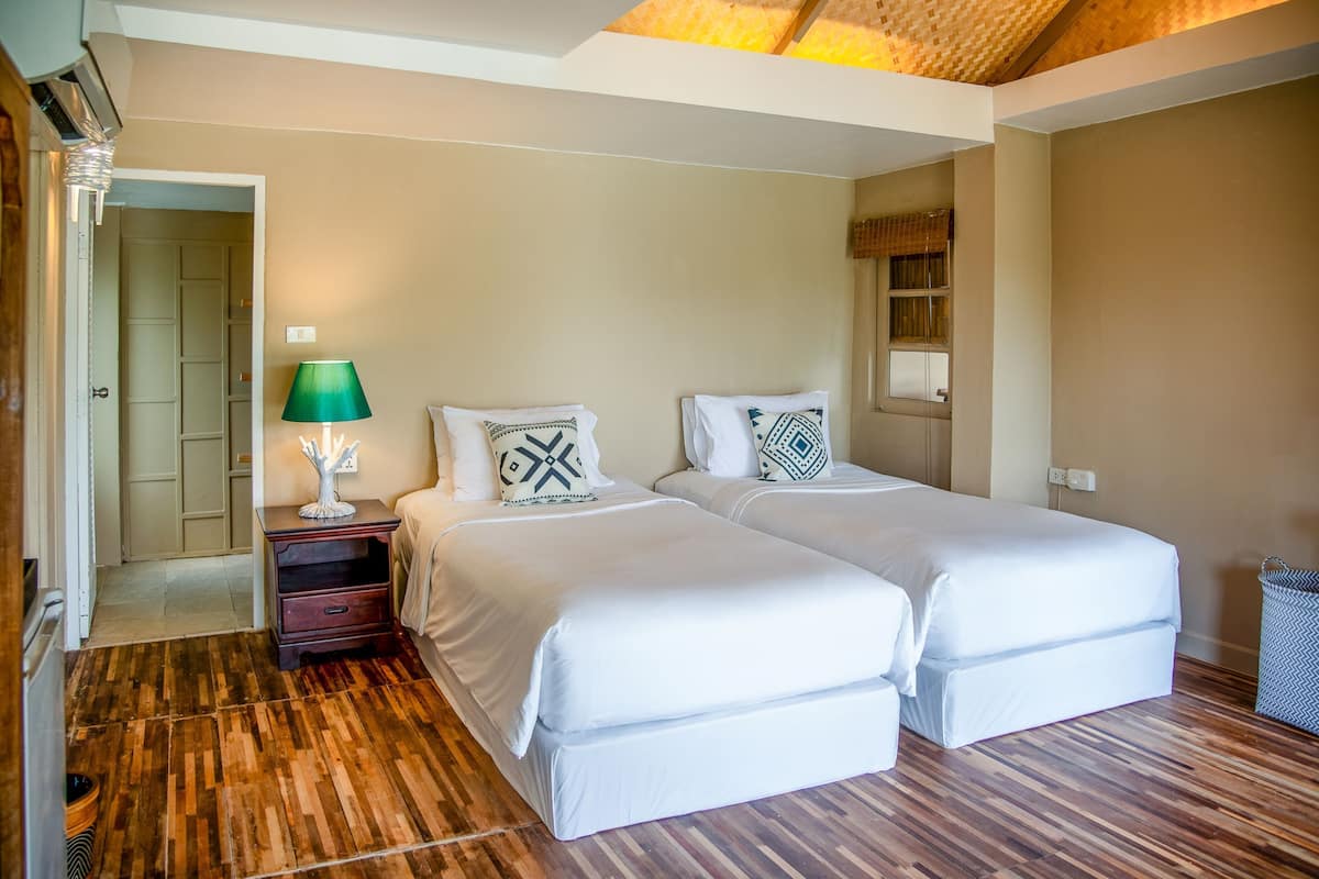 Superior Seaview Villa | 1 bedroom, in-room safe, individually decorated, individually furnished