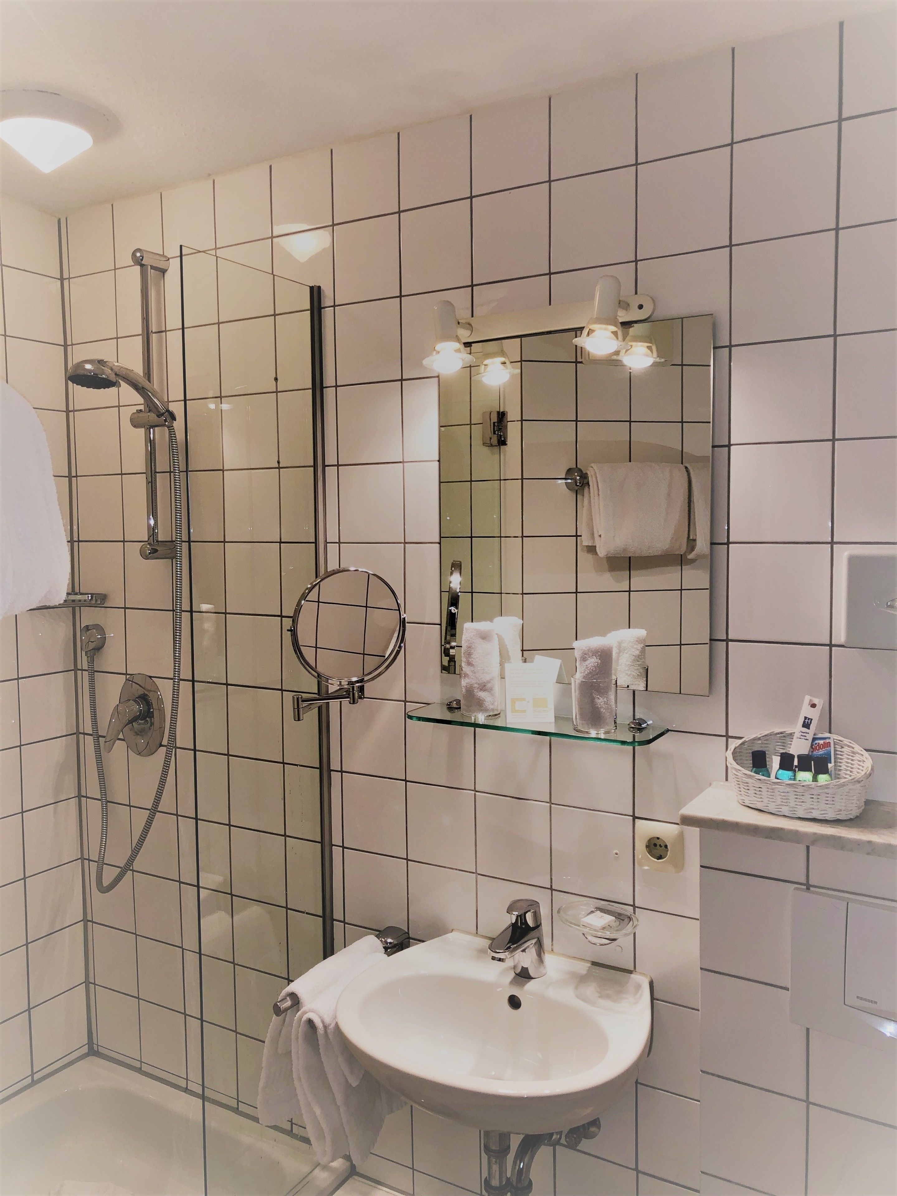 shower, free toiletries, hair dryer, slippers