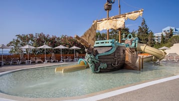 Seasonal outdoor pool, pool umbrellas, pool loungers