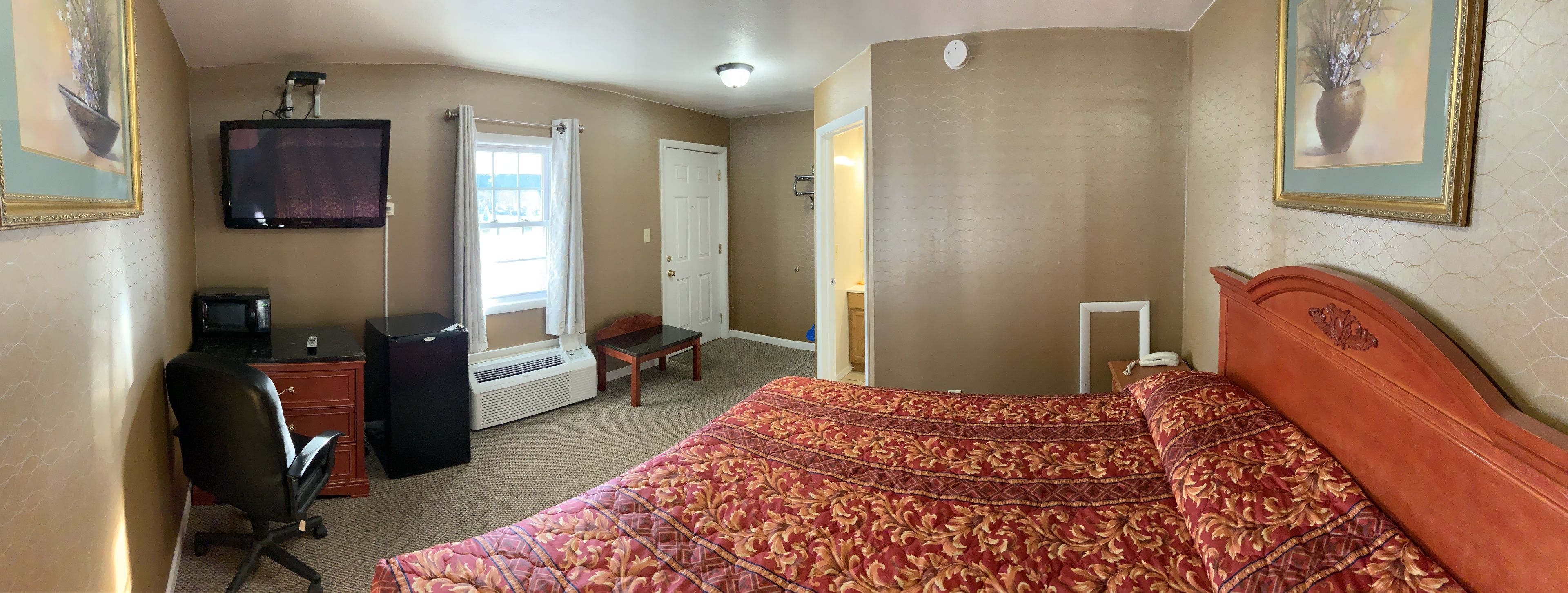 Chambre, 1 très grand lit | Wi-Fi gratuit, réveils, accès pour personnes à mobilité réduite