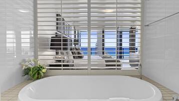 Apartment, 2 Bedrooms, Ocean View | Bathroom | Separate bathtub and shower, hair dryer, towels
