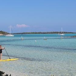 Private beach, white sand, sun loungers, beach umbrellas