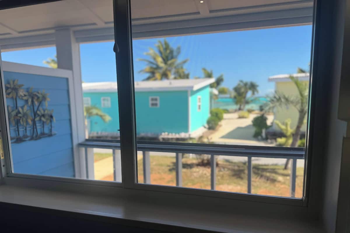 Villa Deluxe, 2 habitaciones, vista parcial al océano, junto a la playa | Vista a la playa o el mar