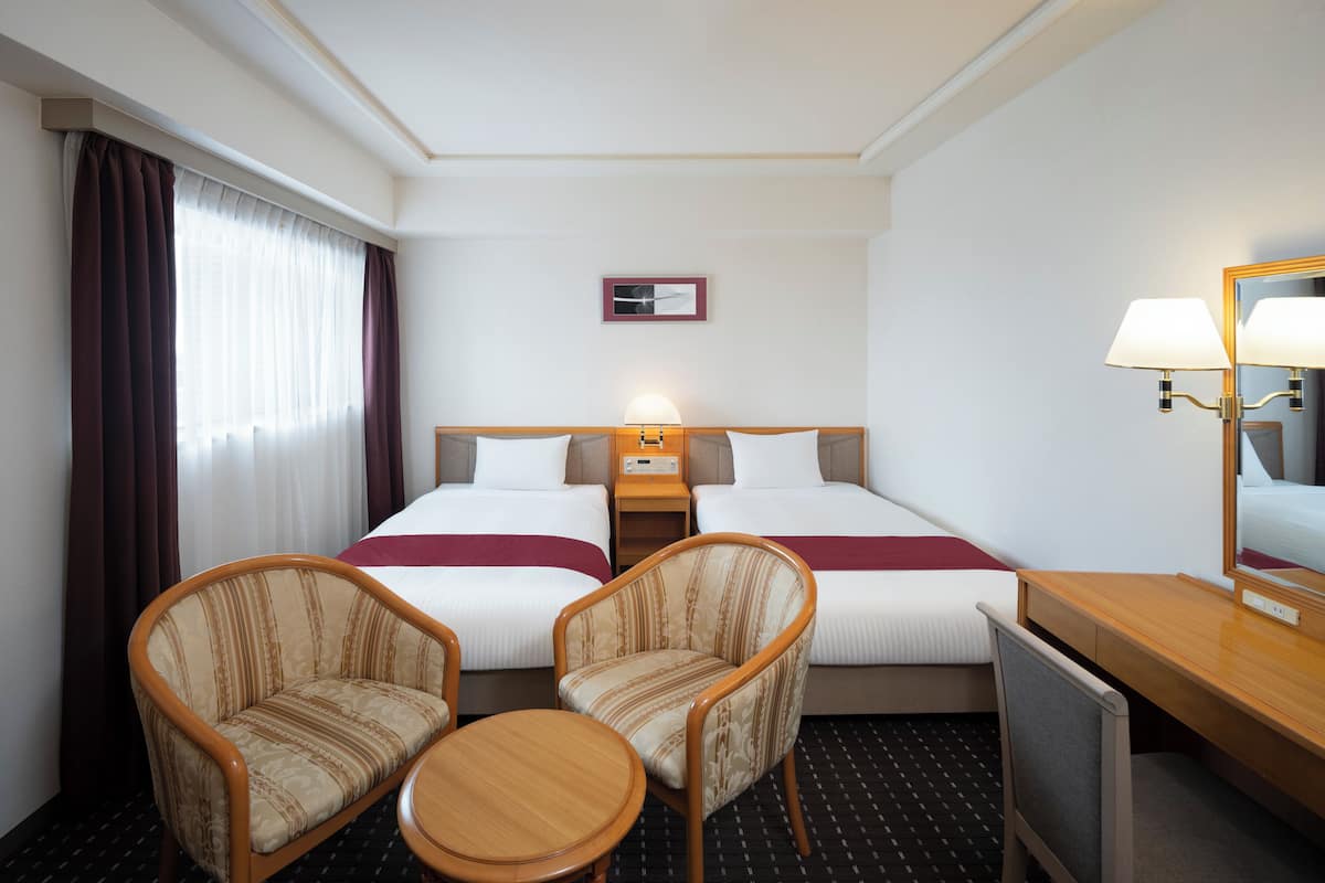 Premium bedding, in-room safe, desk, iron/ironing board (on request)