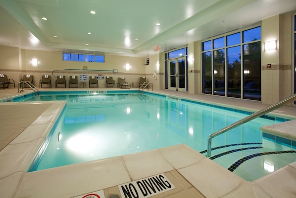 Indoor pool, open 8:00 AM to 10:00 PM, pool loungers