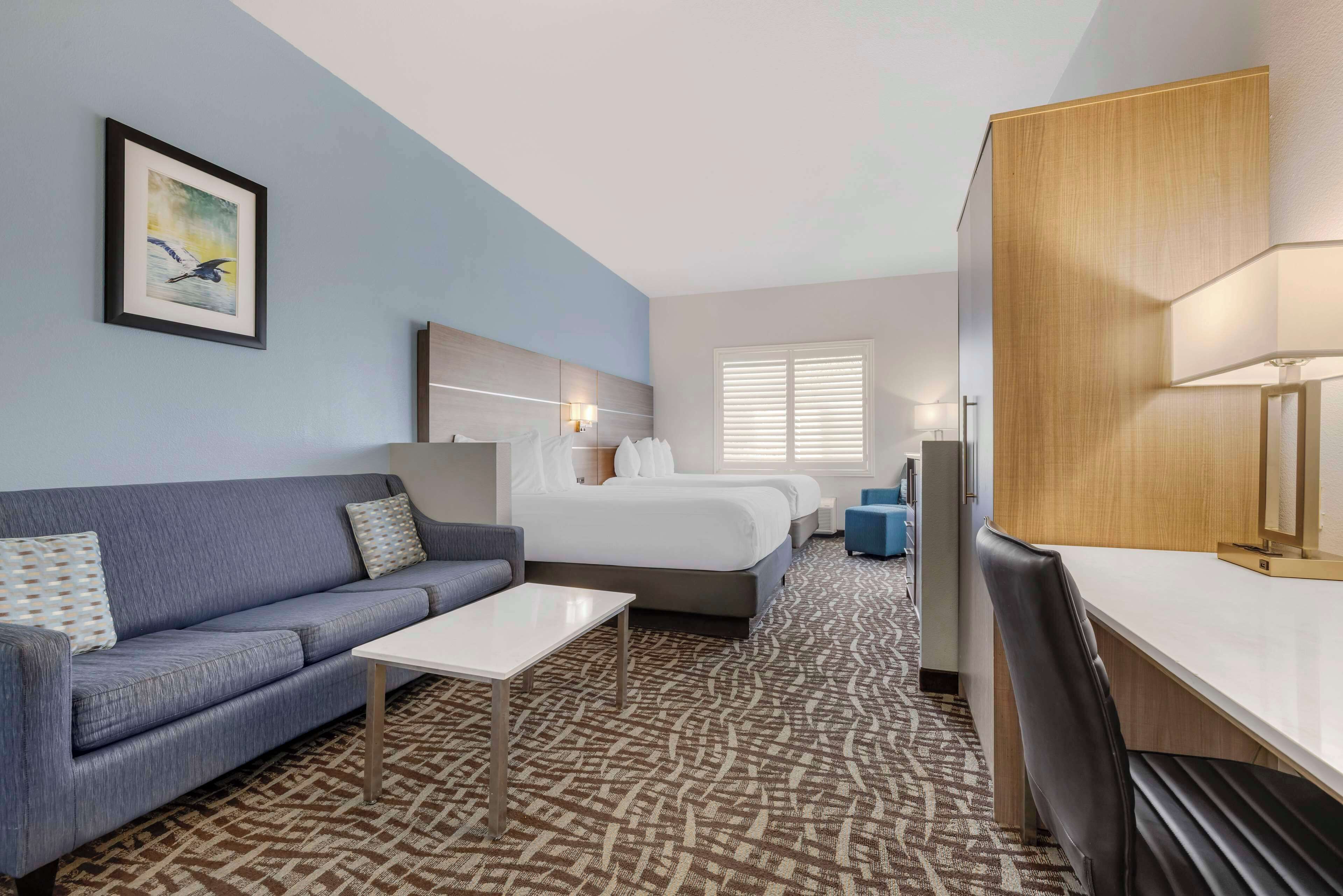 suite, 2 queen beds, non smoking, refrigerator & microwave (with single sofabed) | in-room safe, desk, laptop workspace, iron/ironing board