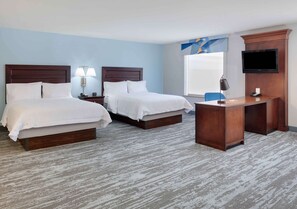 Premium bedding, desk, laptop workspace, blackout curtains
