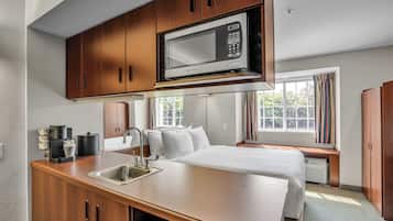 Standard Studio Suite | Premium bedding, desk, laptop workspace, blackout curtains