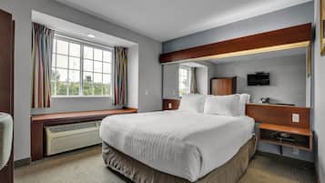 Standard Room | Premium bedding, desk, laptop workspace, blackout drapes