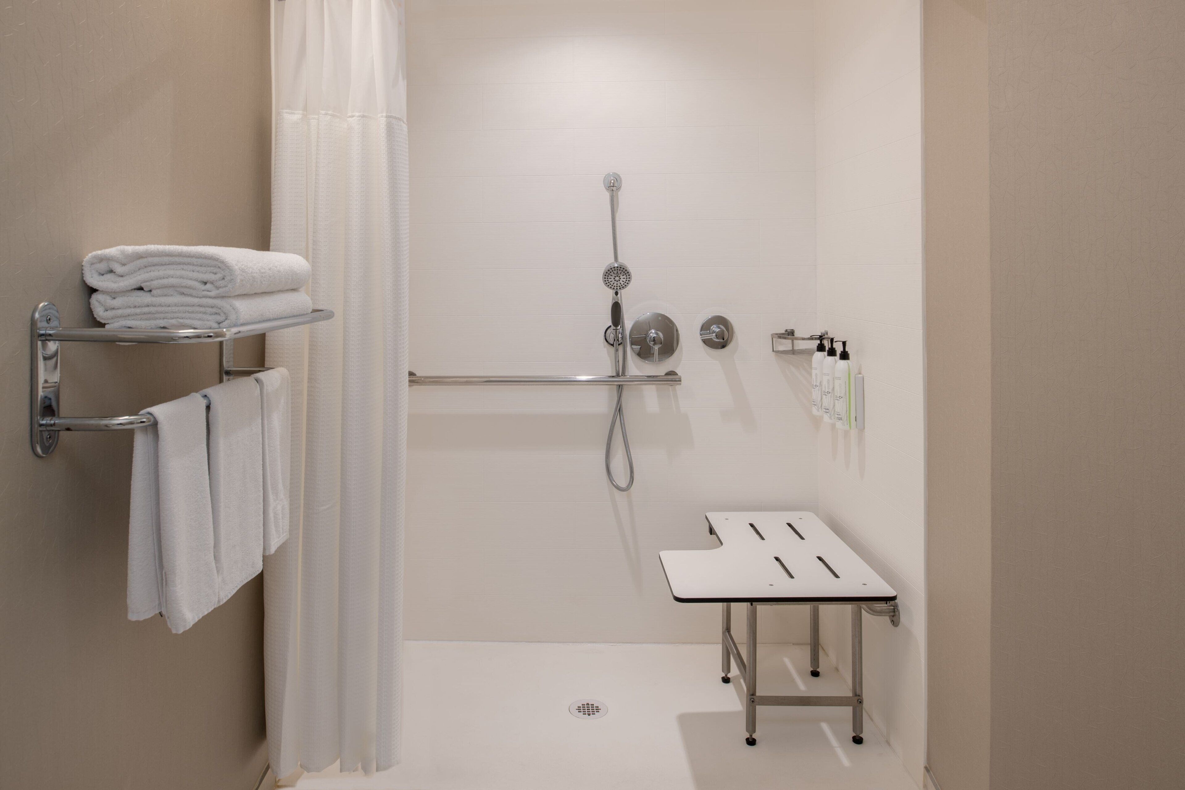 combined shower/bathtub, free toiletries, hair dryer, towels