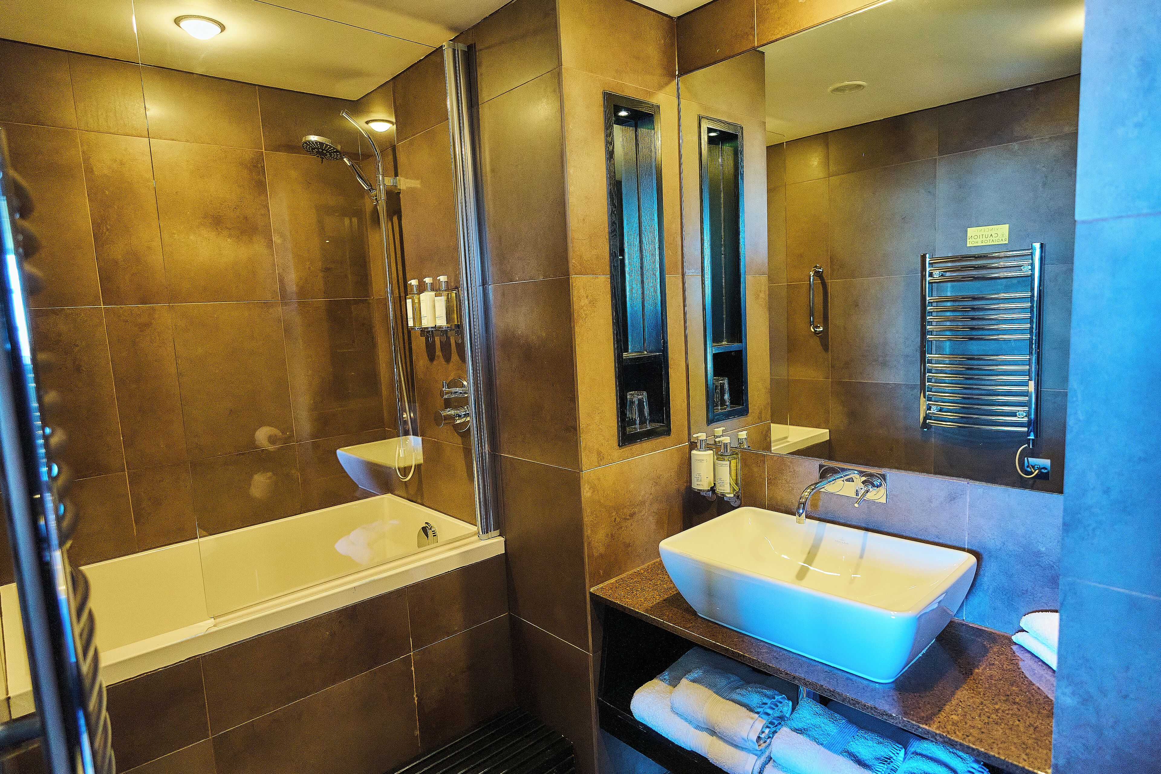 vincent studio | bathroom | designer toiletries, hair dryer, bathrobes, soap