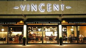 A restaurant named VINCENT with a sign for ORGANIC & SEASONAL PRODUCE and DELICATESSEN. - The Vincent Hotel (Southport)