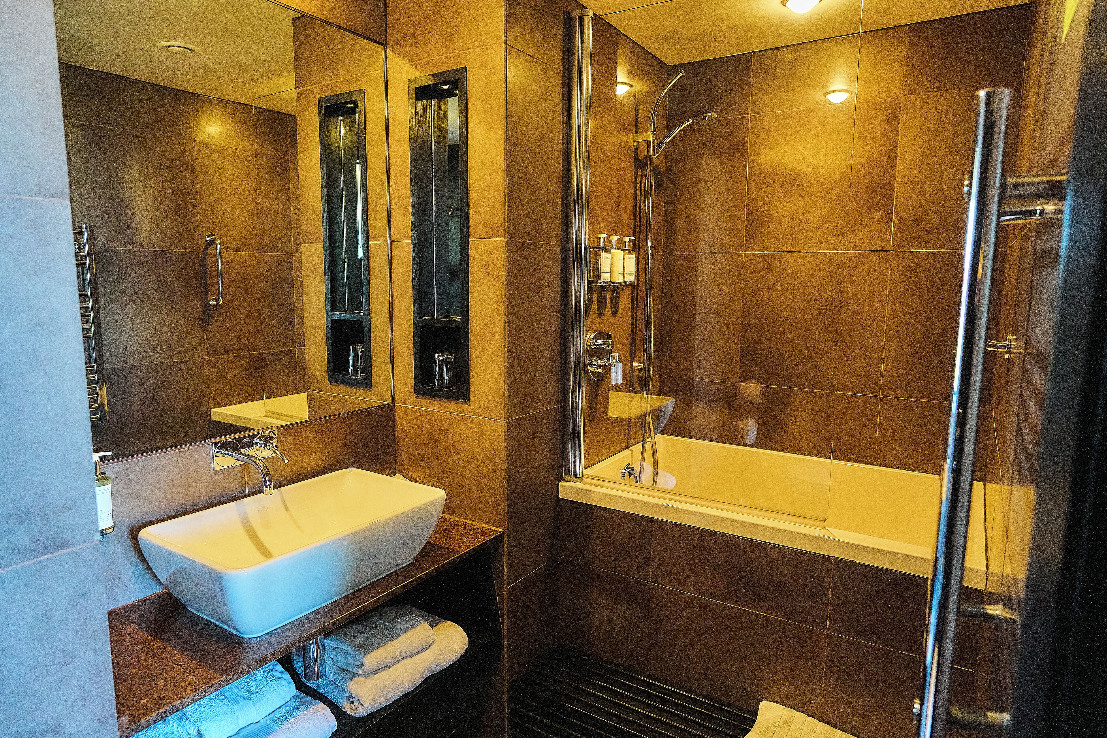 v residence | bathroom | designer toiletries, hair dryer, bathrobes, soap