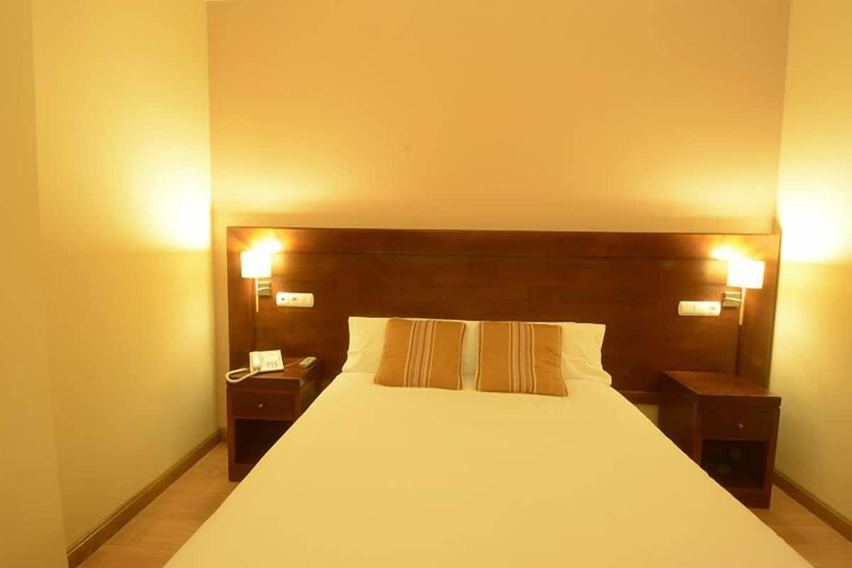 double room | desk, blackout curtains, cots/infant beds, rollaway beds