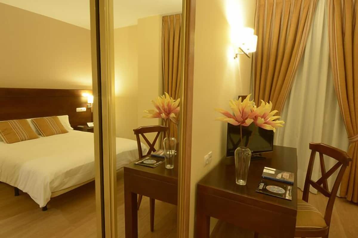 double room | desk, blackout curtains, cots/infant beds, rollaway beds