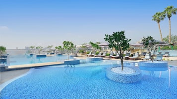 Outdoor pool, open 7:00 AM to 8:00 PM, free pool cabanas, pool umbrellas