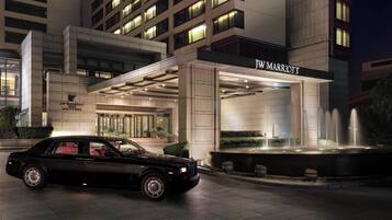 Experience luxury at the JW Marriott, where a striking entrance and beautifully landscaped surroundings set the tone for a sophisticated stay.