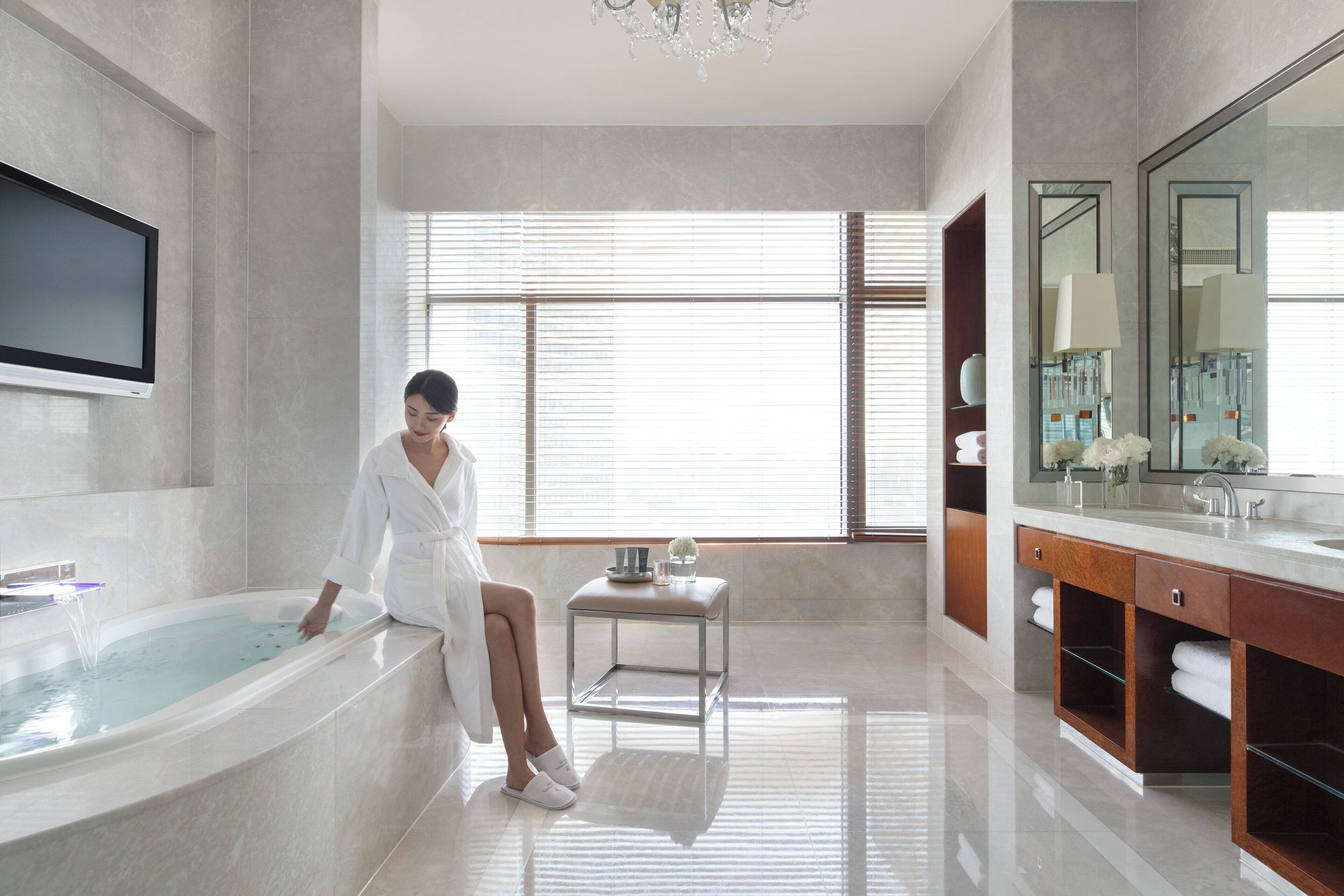 separate bathtub and shower, designer toiletries, hair dryer, bathrobes