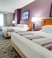 Desk, blackout drapes, iron/ironing board, free cribs/infant beds