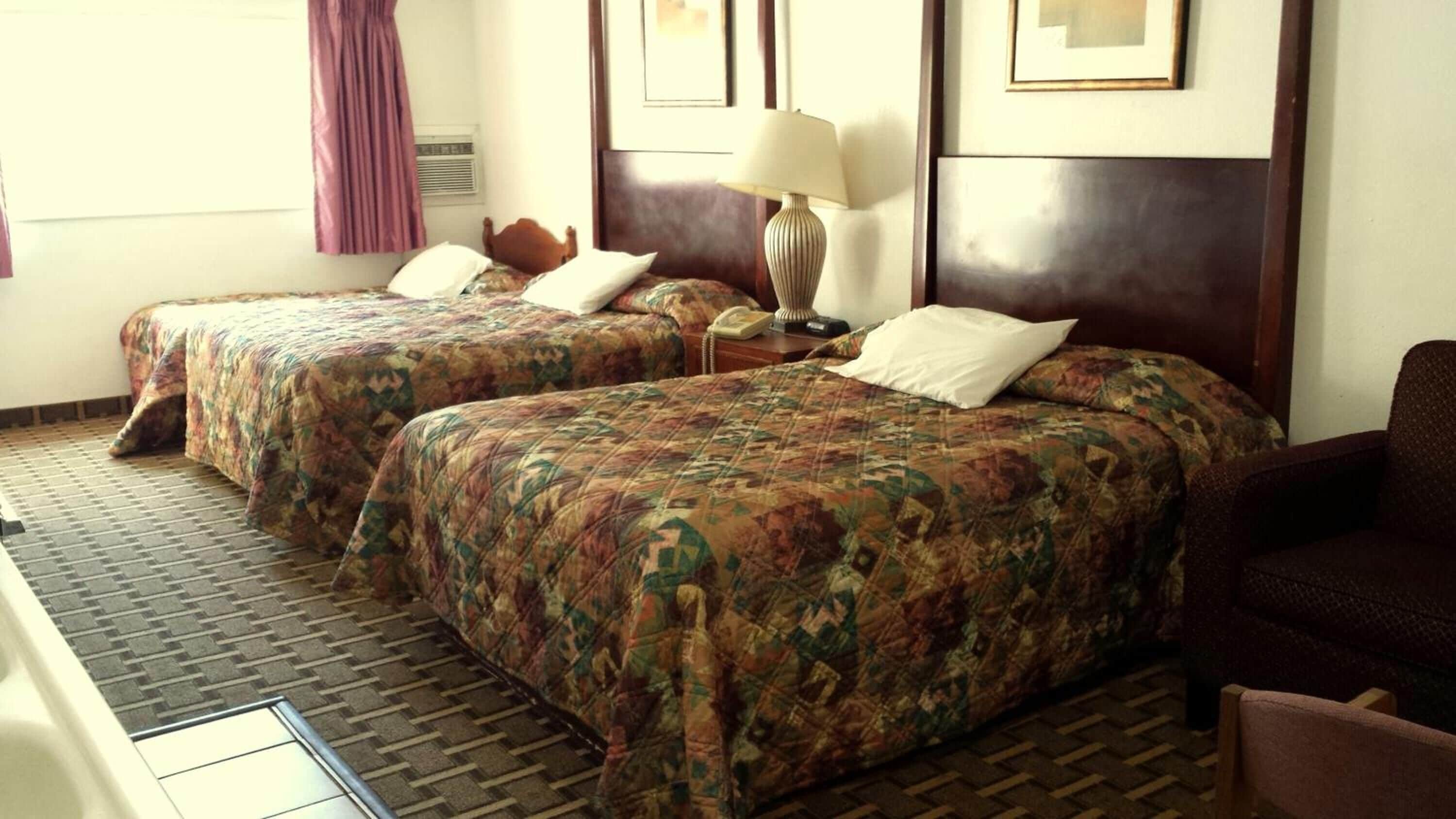 Desk, free WiFi, bed sheets, alarm clocks