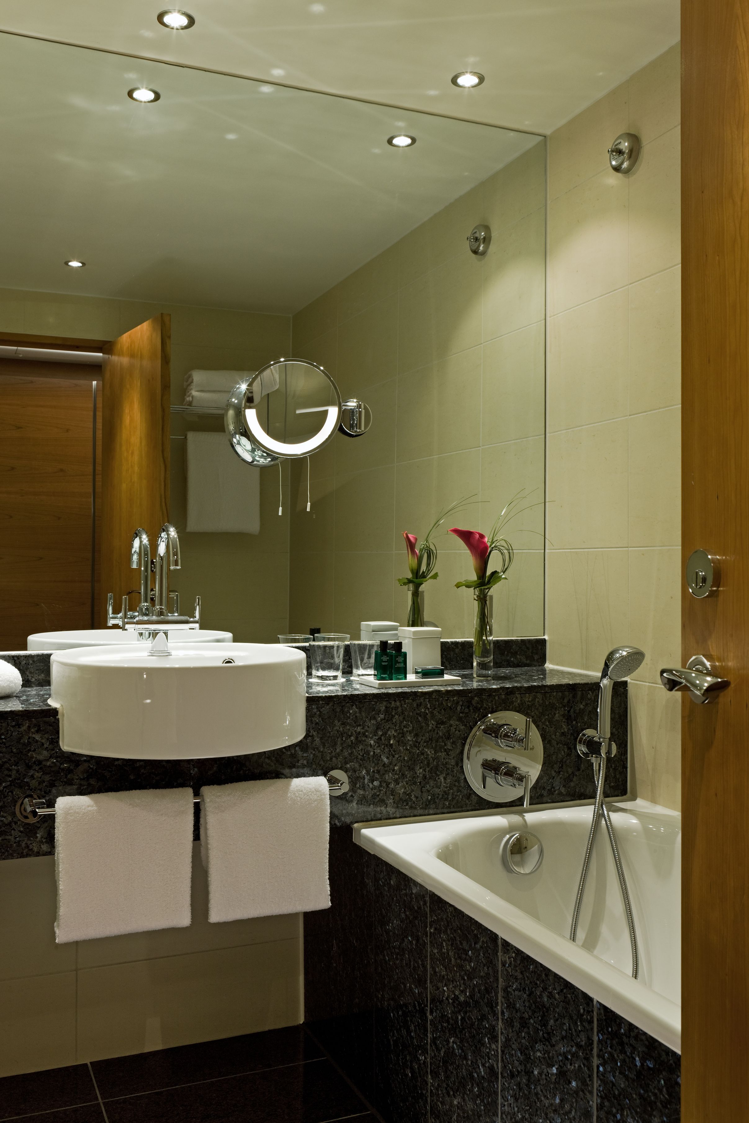 separate bathtub and shower, designer toiletries, hair dryer, bathrobes