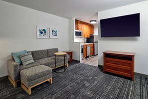 32-inch flat-screen TV with satellite channels, Netflix