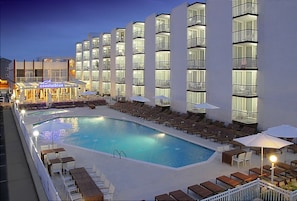 Seasonal outdoor pool, pool umbrellas, pool loungers