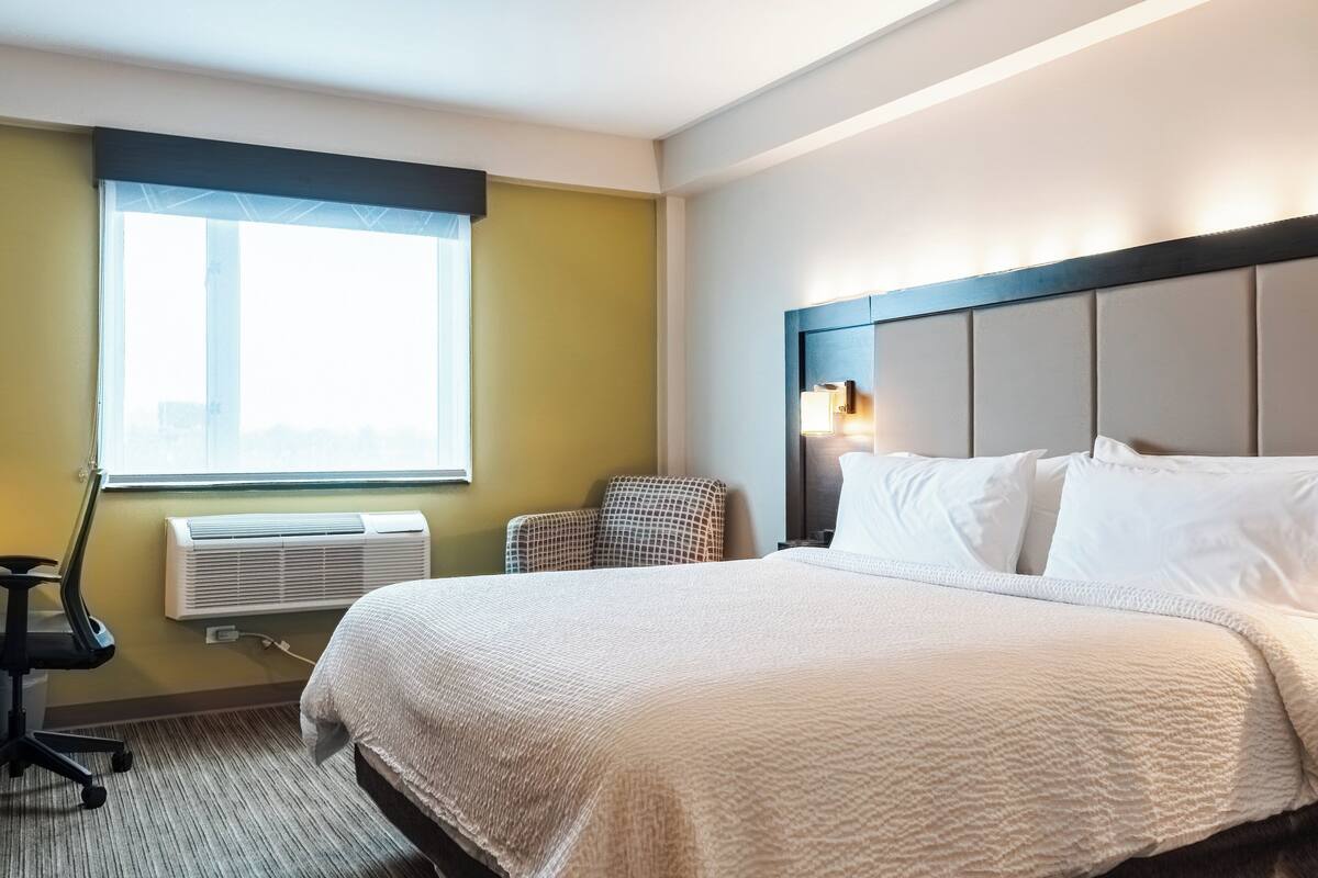 down duvets, pillow-top beds, in-room safe, desk