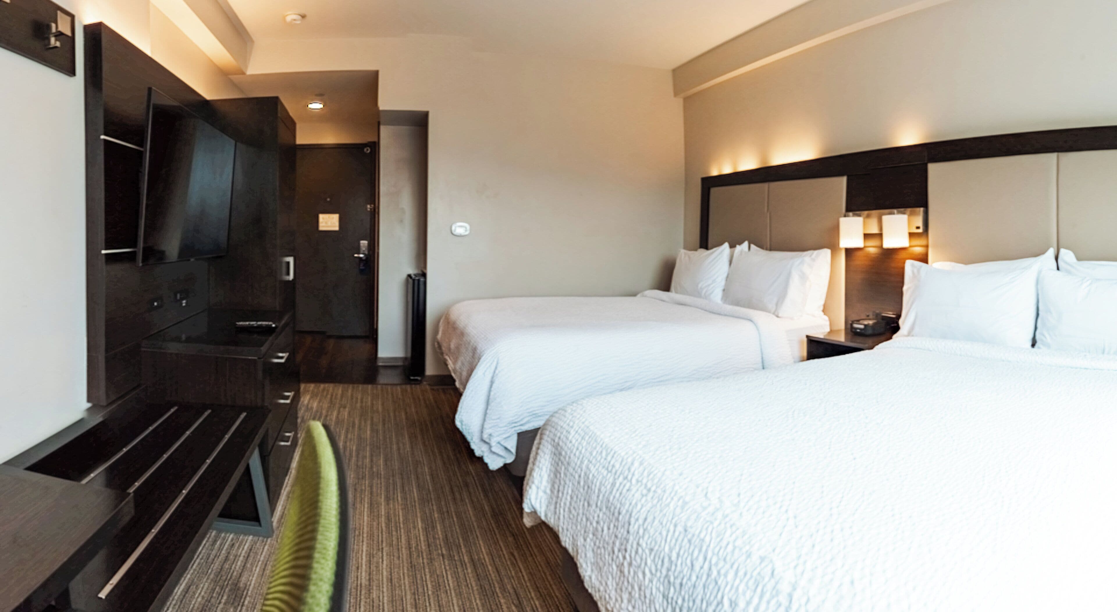 Down comforters, pillowtop beds, in-room safe, desk