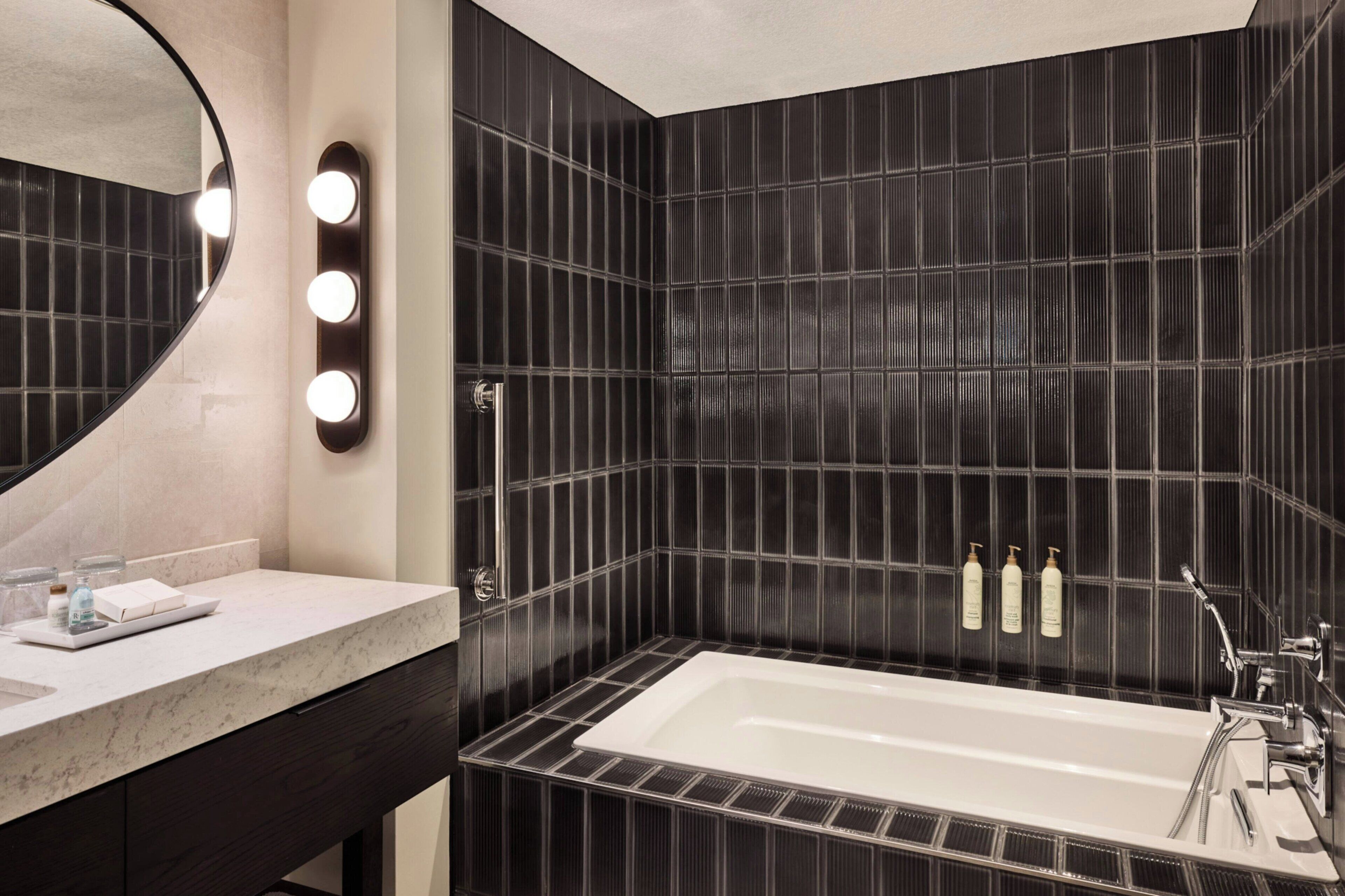 combined shower/bathtub, free toiletries, hair dryer, bathrobes