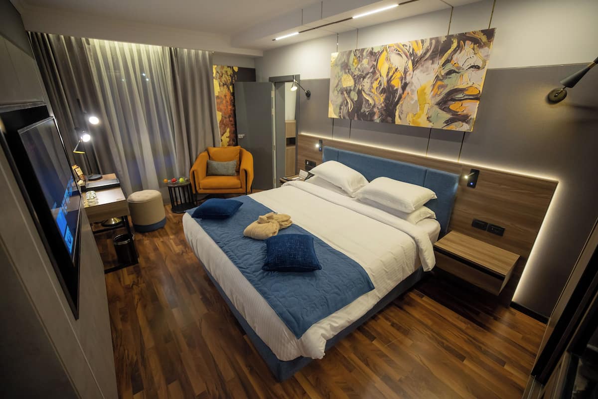 Premium suite (24/7 Butler Lounge Access) | 1 slaapkamer, lakens van Egyptisch katoen, een minibar