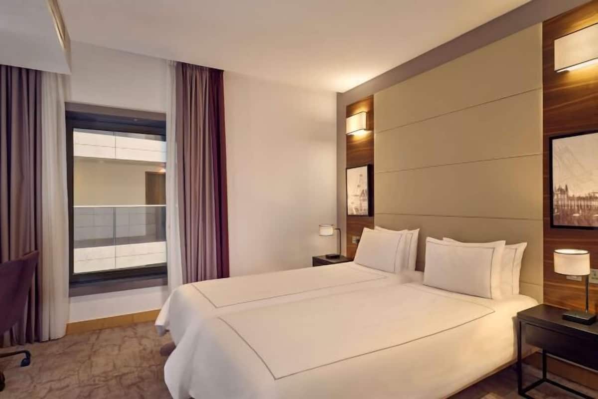 Egyptian cotton sheets, premium bedding, minibar, in-room safe