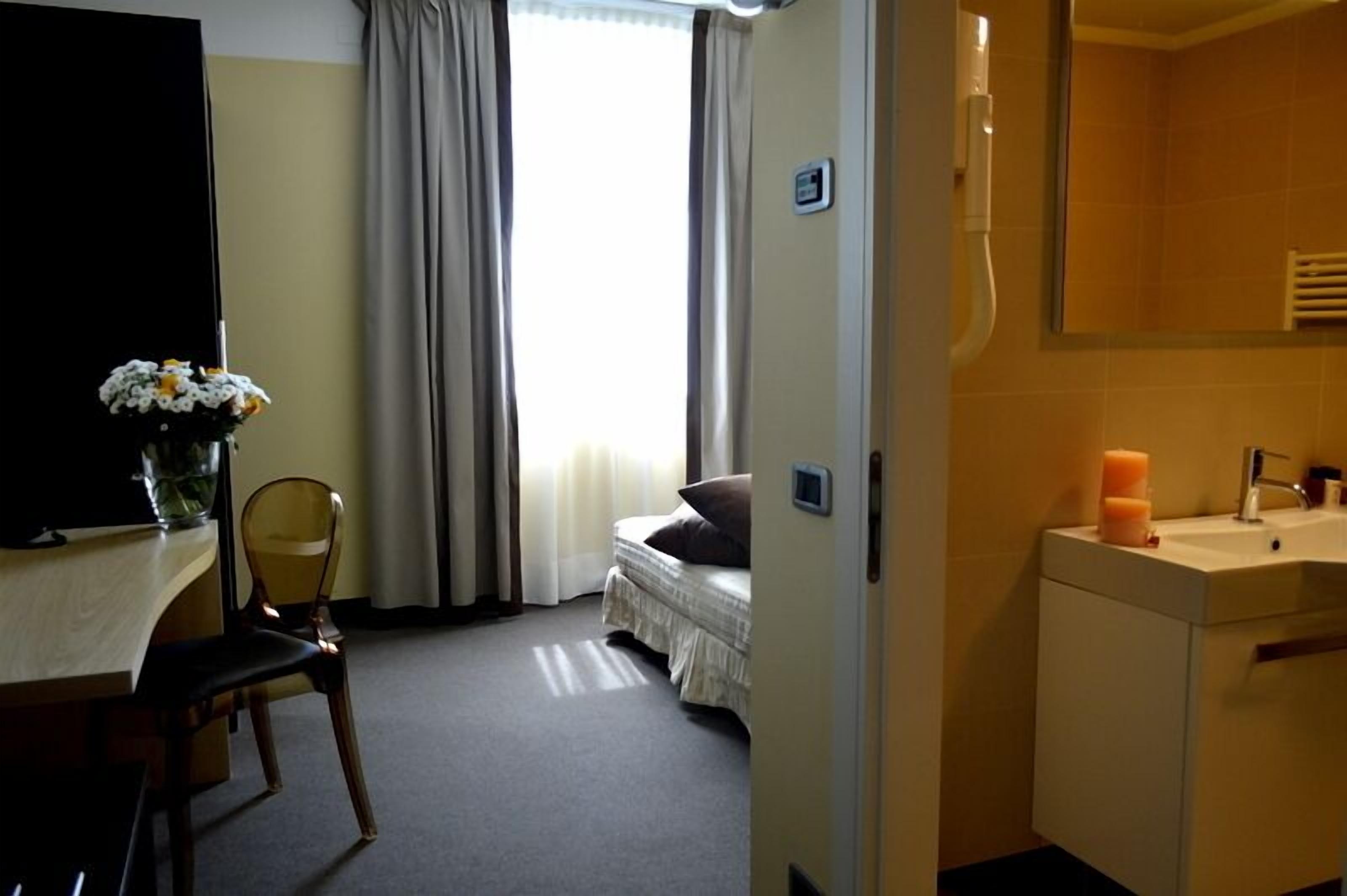 shower, hair dryer, slippers, bidet