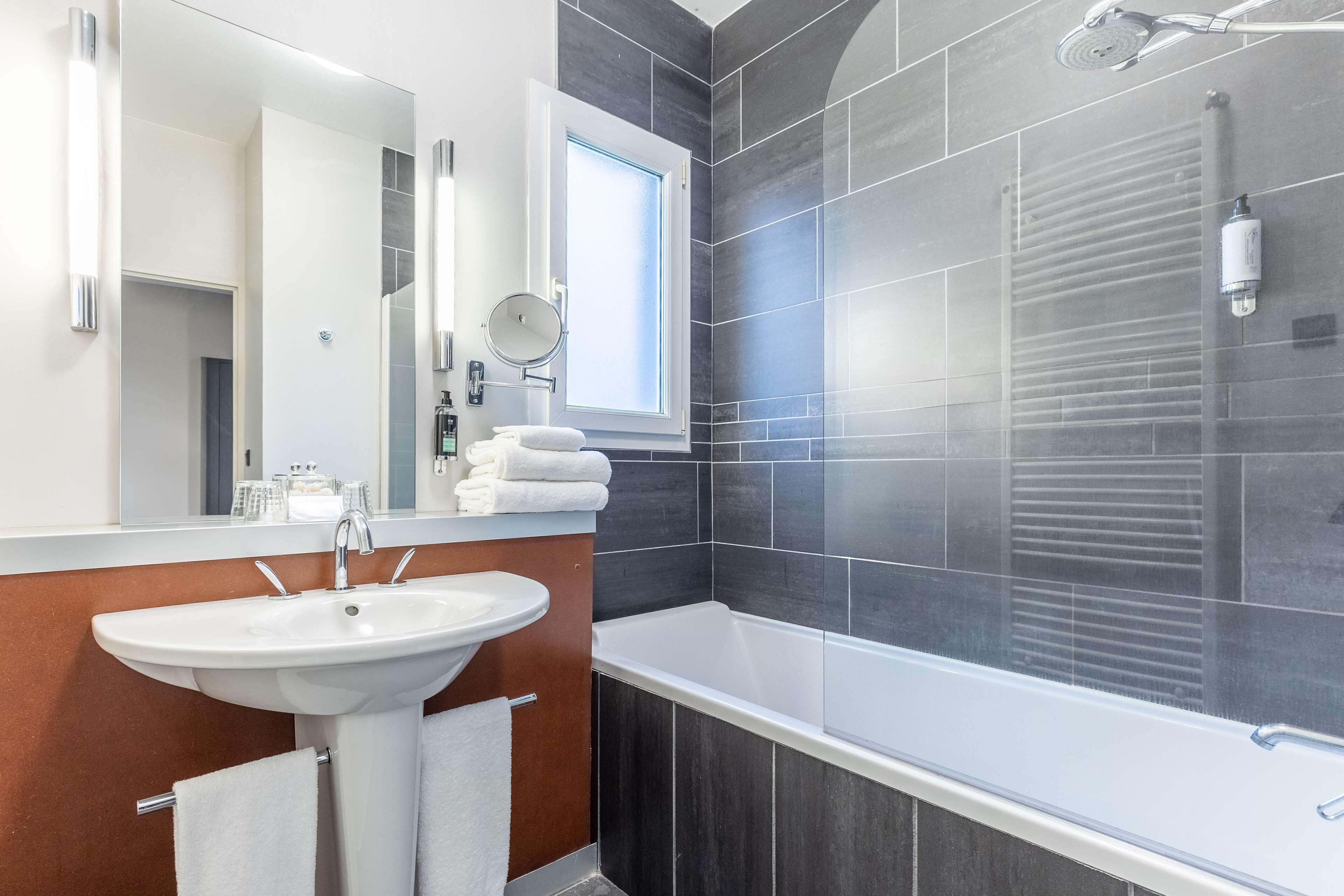 eco-friendly toiletries, hair dryer, towels