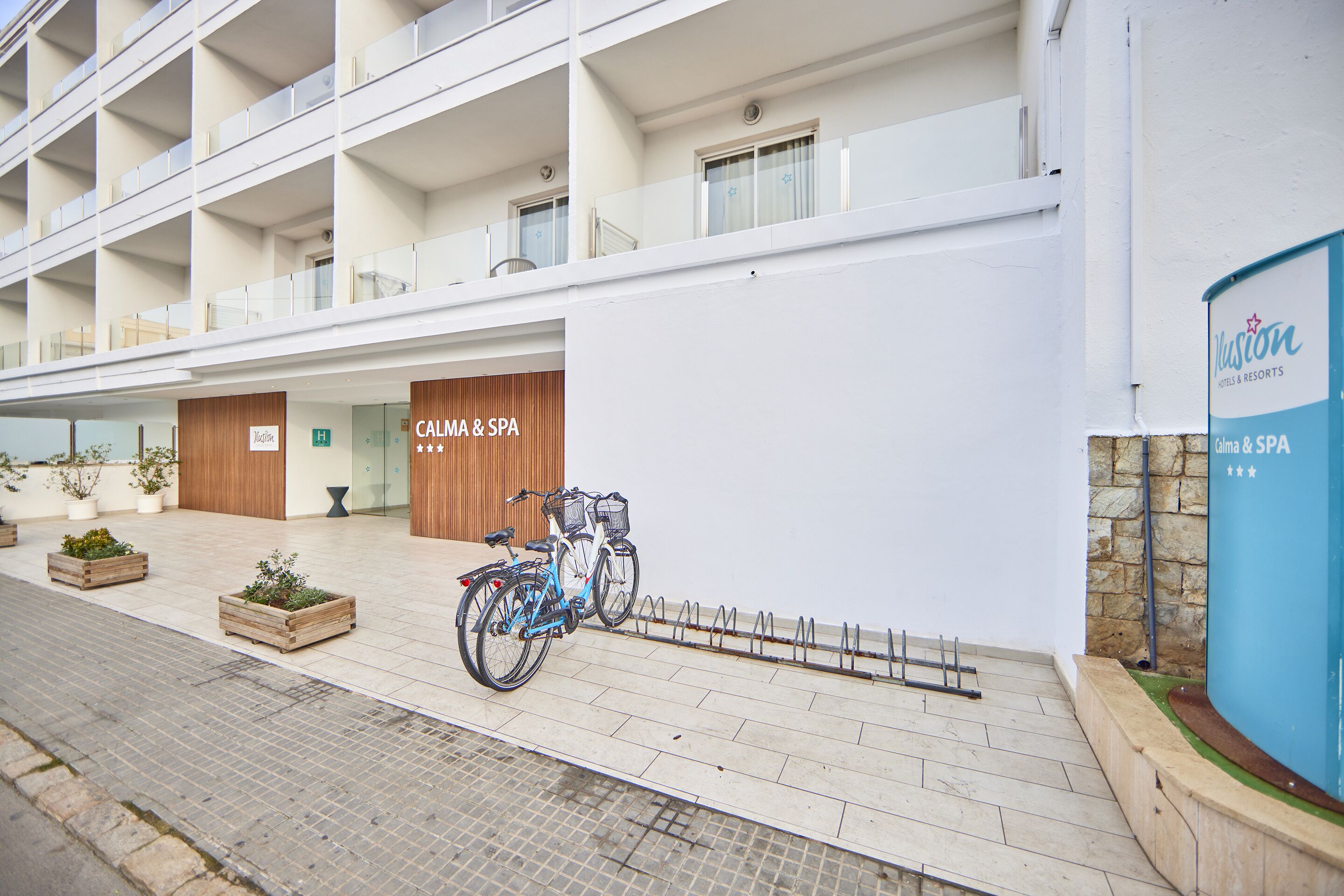 A hotel with a modern design, featuring a spa and fitness center.