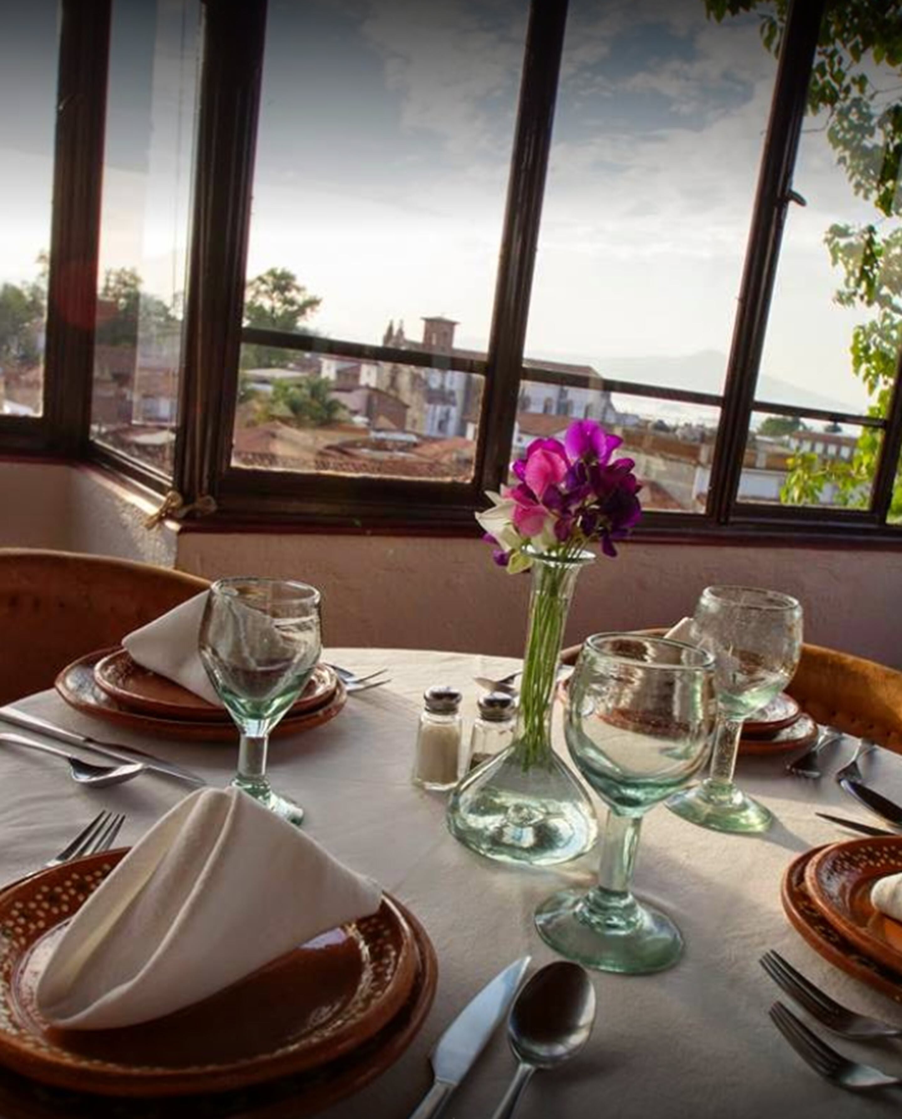 Breakfast, lunch, dinner served; local cuisine, alfresco dining 