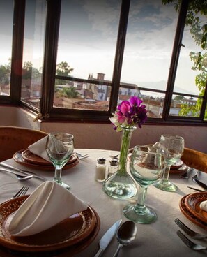 Breakfast, lunch, dinner served; local cuisine, alfresco dining 