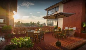 Breakfast, lunch, dinner served; local cuisine, alfresco dining 