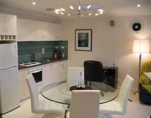 Premier Apartment, Non Smoking, Kitchen (INTEGRITY PREMIER SPA) | Living area | LCD TV, DVD player - The Charles Robbins (George Town)