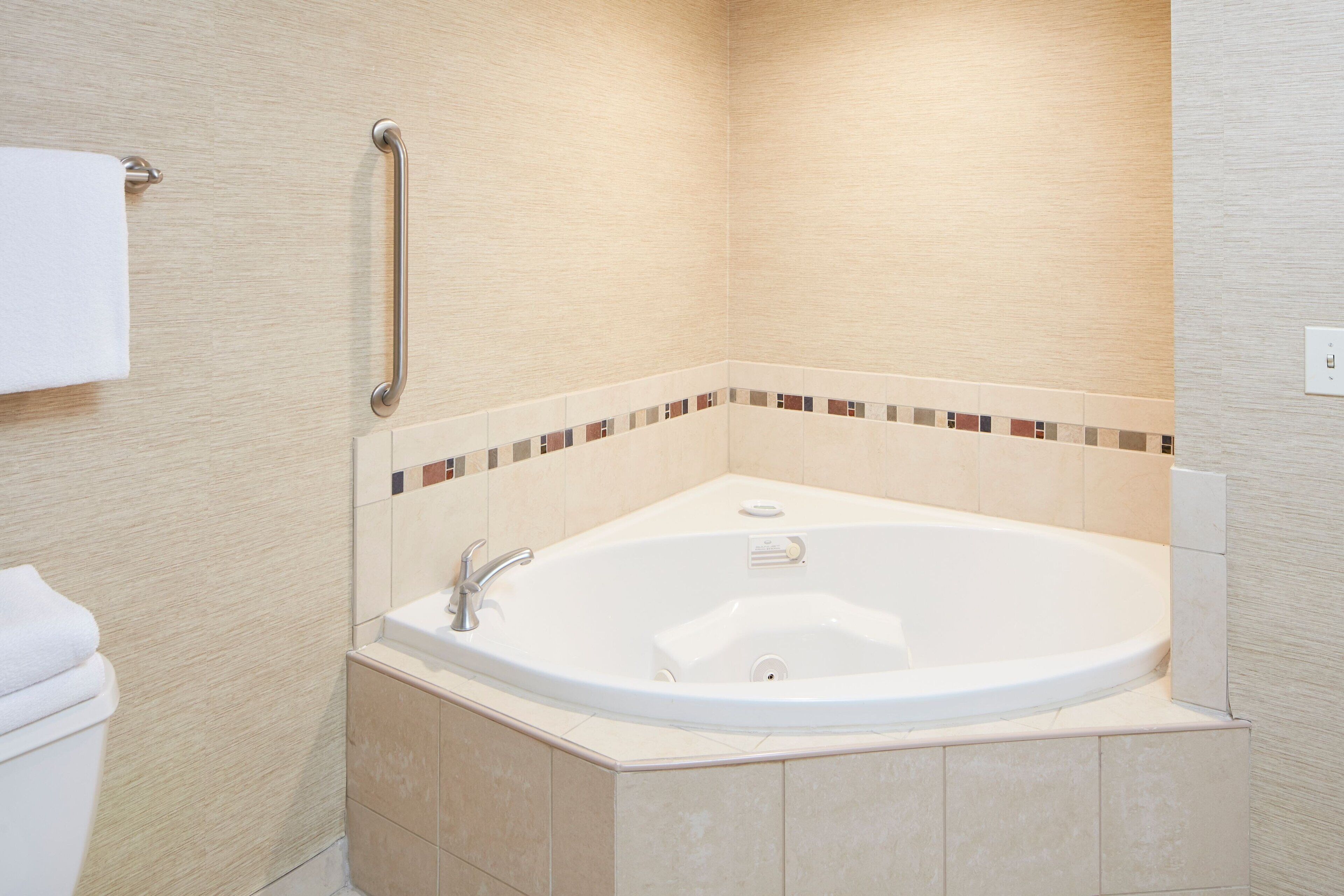 premium bedding, pillow-top beds, desk, laptop workspace