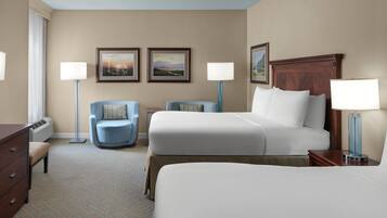 Premium bedding, pillow-top beds, desk, laptop workspace