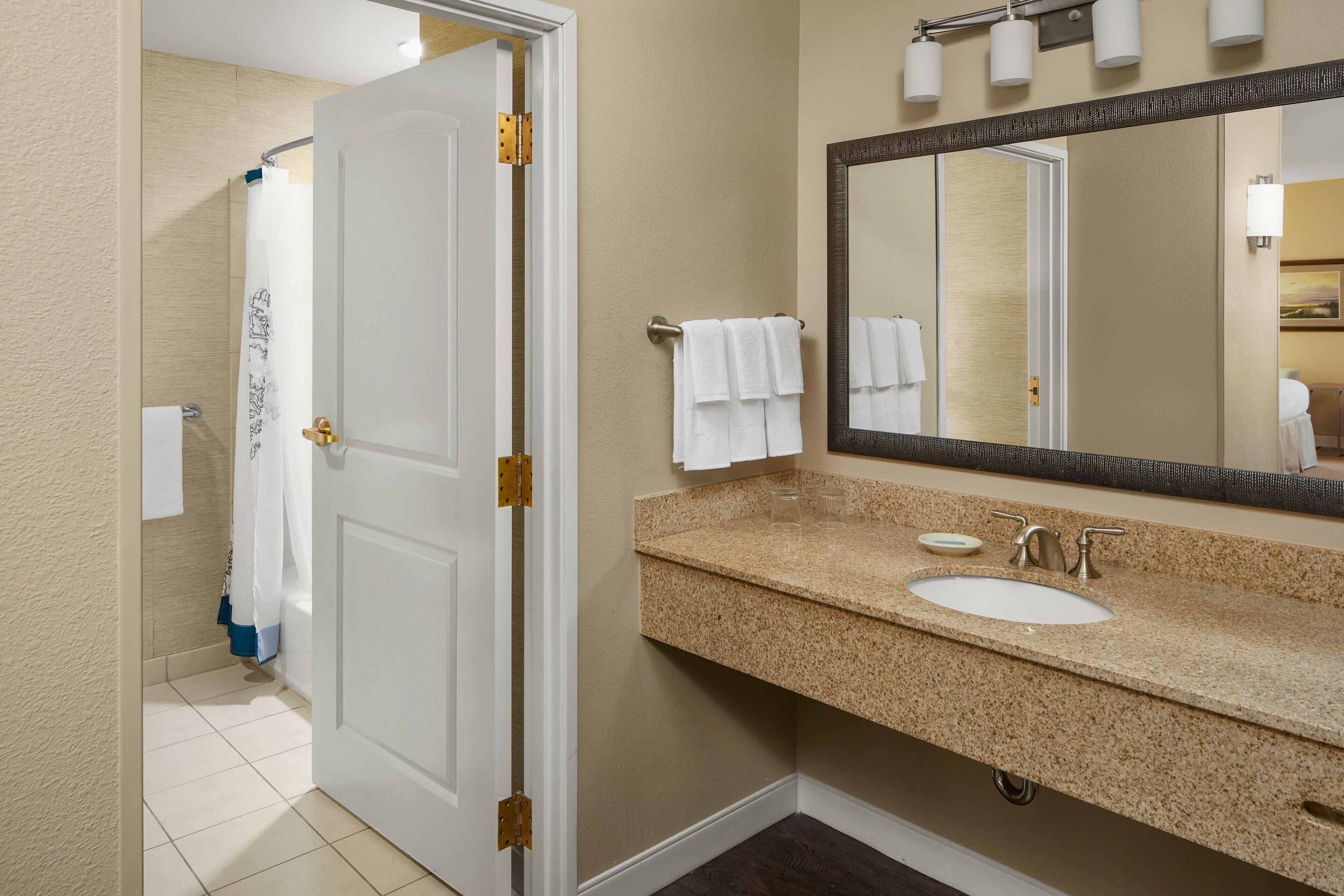 combined shower/bathtub, free toiletries, hair dryer, towels