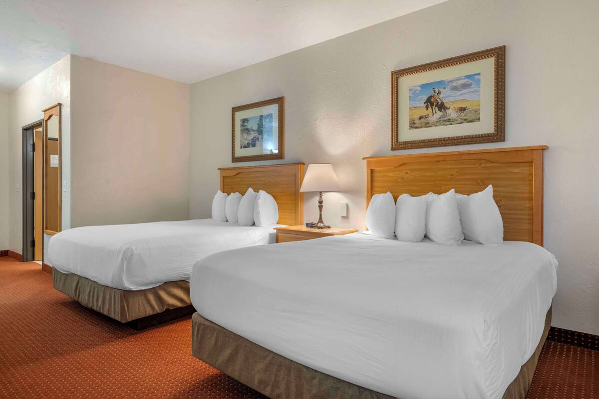 standard room, 2 queen beds, non smoking, refrigerator & microwave | laptop workspace, iron/ironing board, free cots/infant beds, free wifi