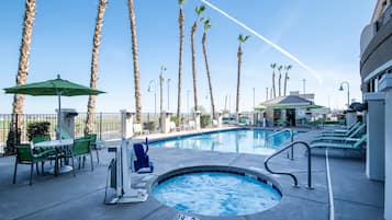 Outdoor pool, open 6:00 AM to midnight, sun loungers