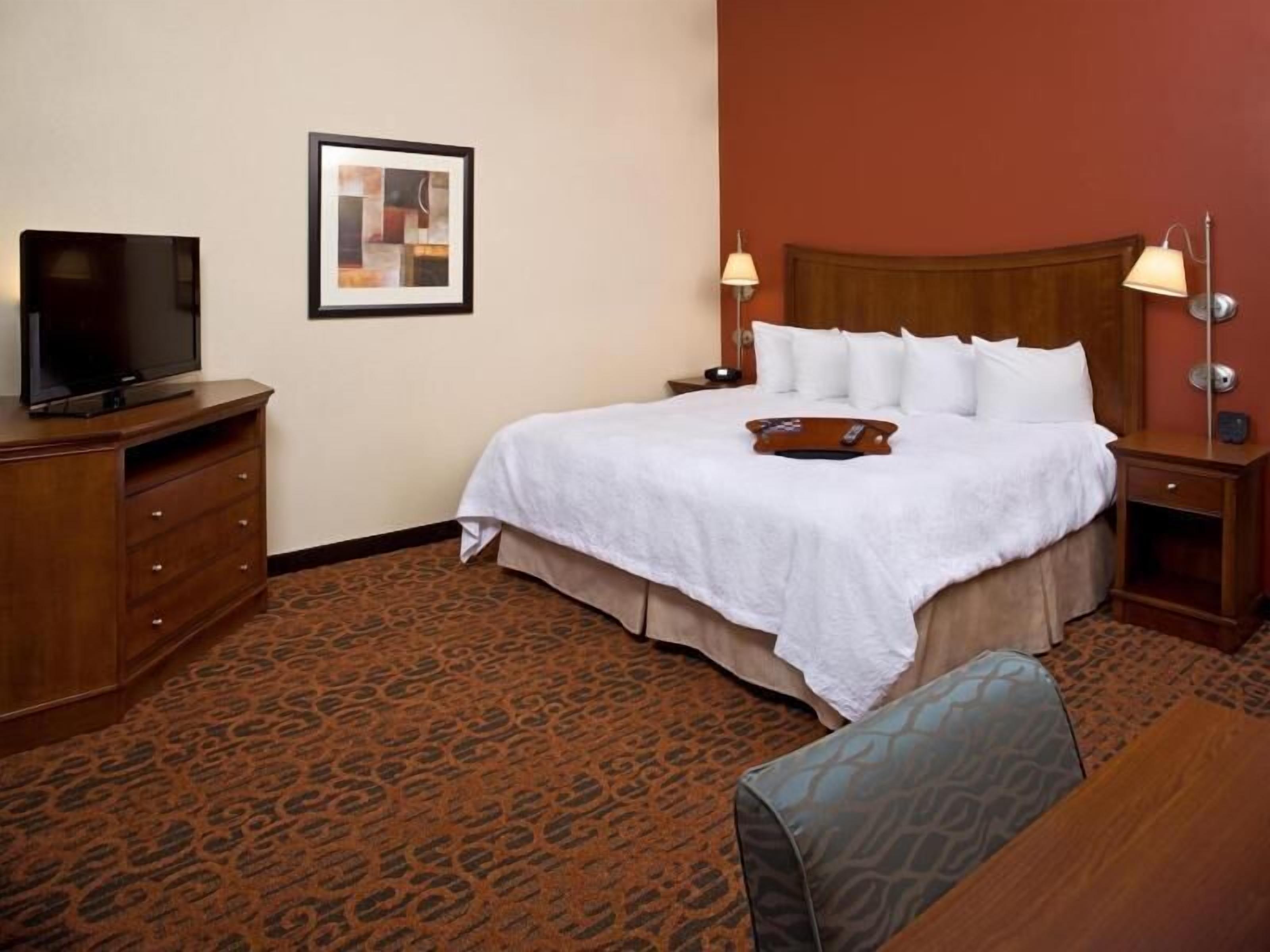 Premium bedding, down comforters, pillowtop beds, laptop workspace